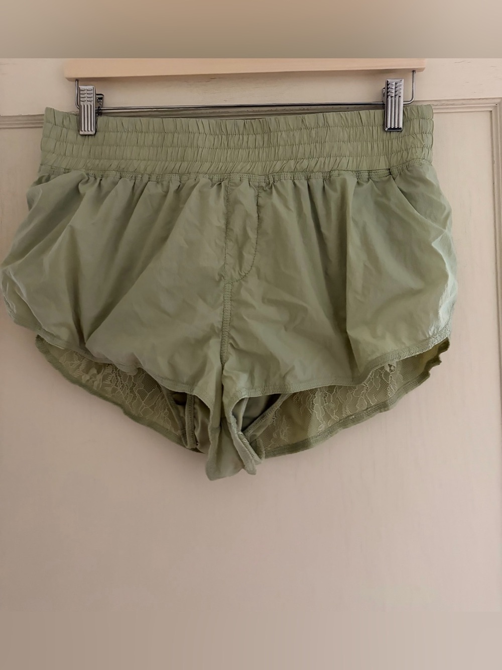 Free People Movement light green running shorts with lace trim lining